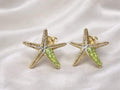 Pendiente estrena de mar de plata con peridoto-Pendiente elegante ,hecho a mano-Joya inspirada en el oceano-Regalo mujer.